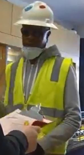 Suspect dressed as construction worker